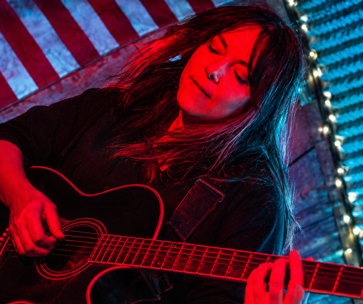 a.possiblefrontcoverangie red with guitar